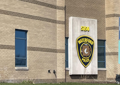Police department building with badge emblem on exterior wall