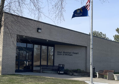 Public building with flagpole displaying American flag